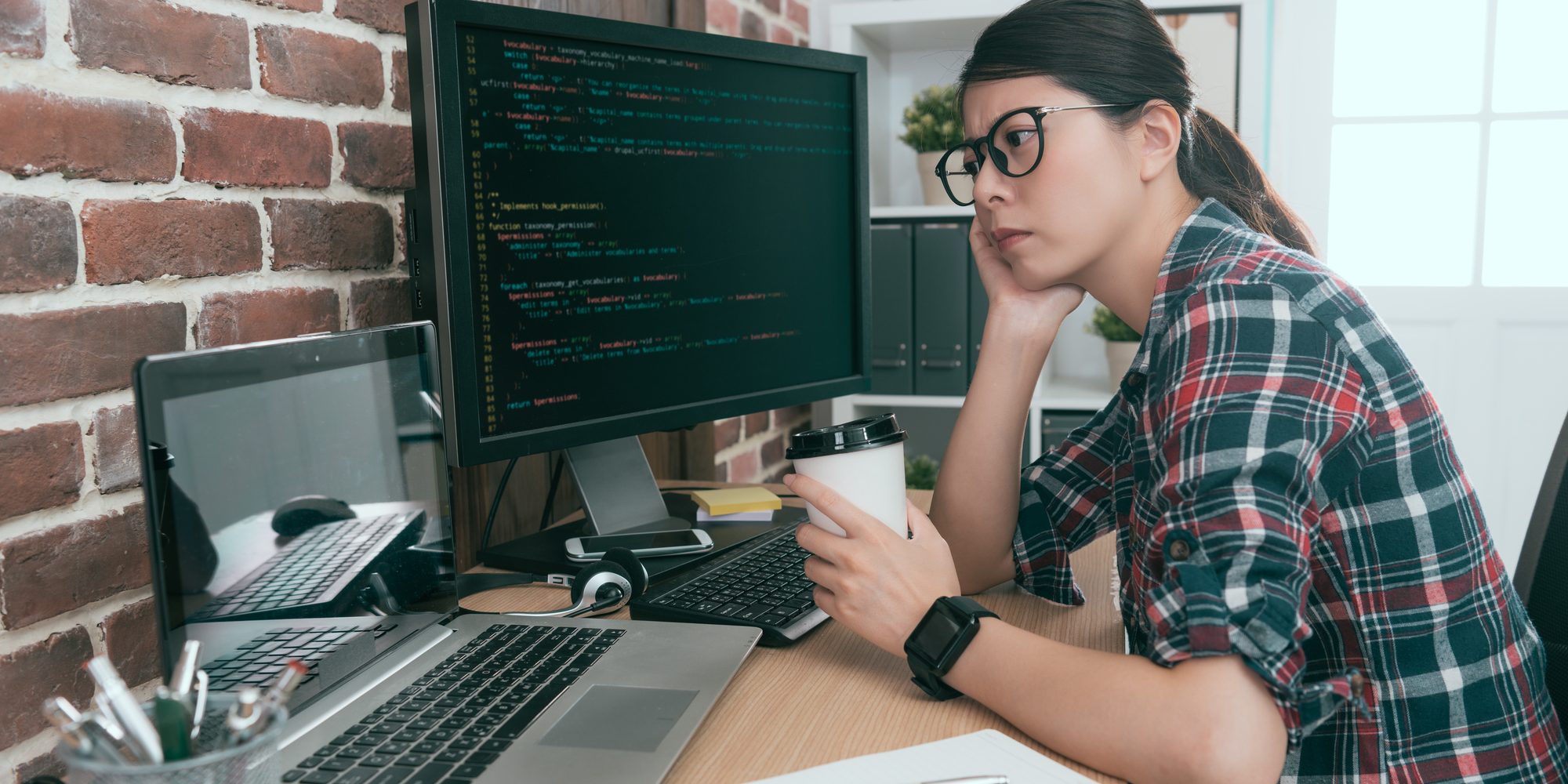 beauty lady computer worker looking at code data